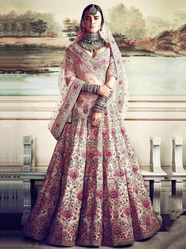 Prominent peach Colored Bridal wear Embroidered Lehenga Choli